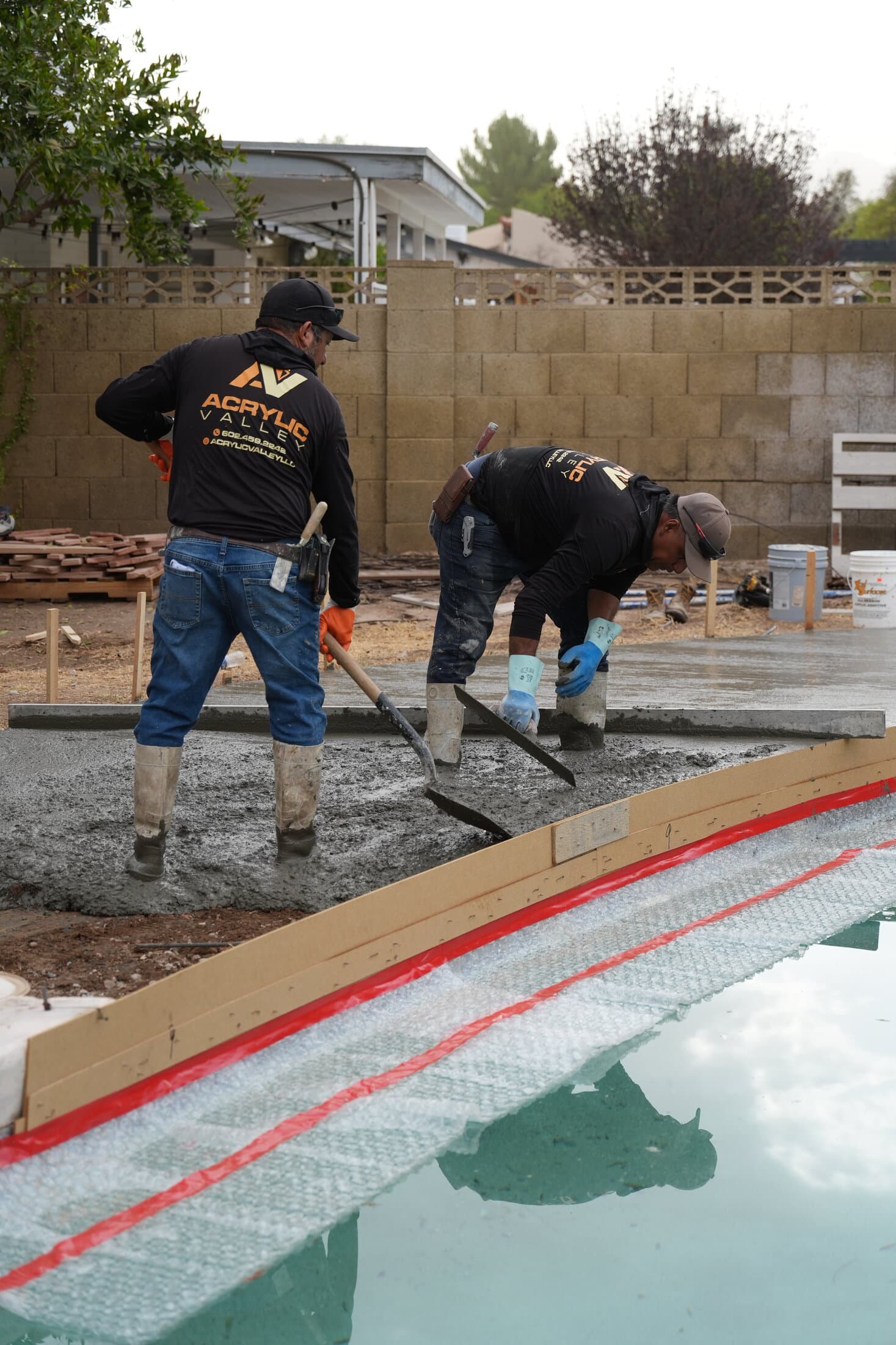 Acrylic Valley crew pouring and finishing new concrete